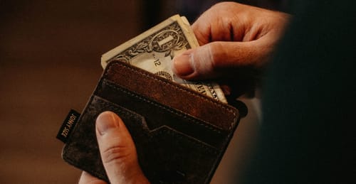 Wieso muss ich eine Transaktionsgebühr bezahlen?